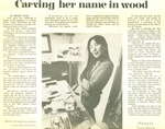 Carving her name in wood