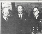 Oakville's Mayor Deans, Defence Minister Angus MacDonald, and Admiral Percy Nelles at the HMCS Oakville's Christening Ceremony