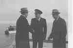 Lt. A.C. Jones R.C.N.R., Commanding Officer of HMCS Oakville Meets Oakville Officials