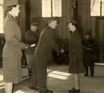 Joy Smith receiving her commission from her father, Lieutenant Colonal F.H. Dunham MC, on February 15, 1945. Looking on are Captain Carlyle (left) and Major General Potts District Officer Commanding #2 Military District (centre).