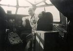 Jack Wyndham, Radio Navigator for the Royal Air Force Ferry Command inside a flying boat at Boucherville, Quebec, 1942